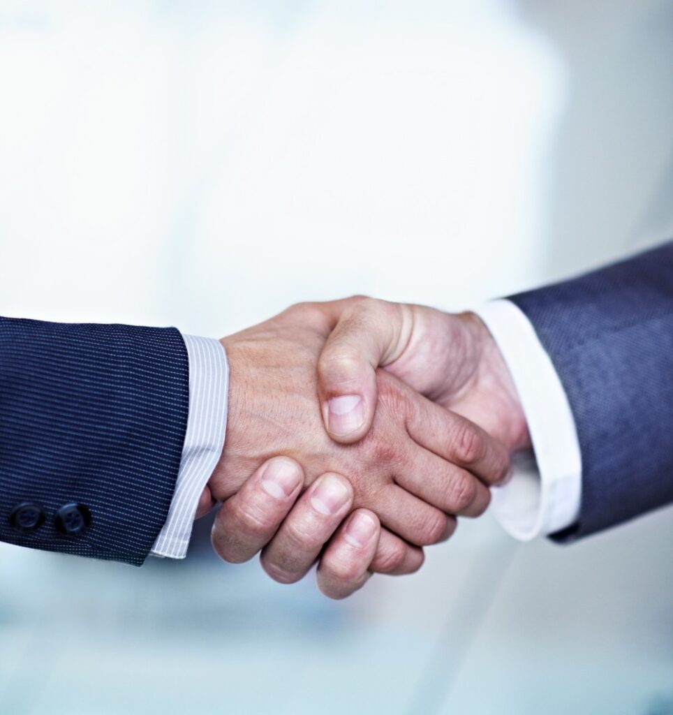 Two business partners shaking hands